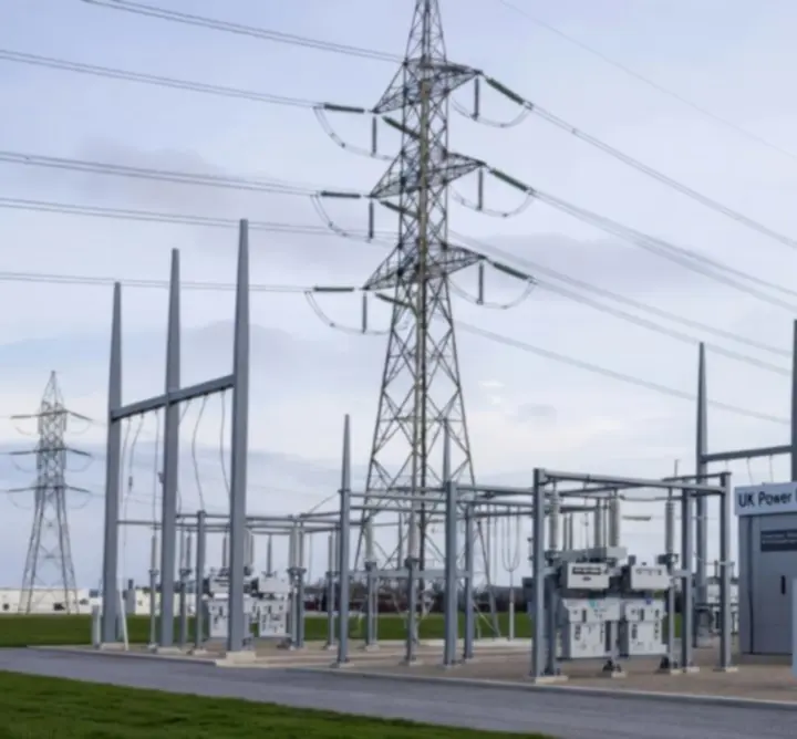 Modern UK energy infrastructure illuminated at night